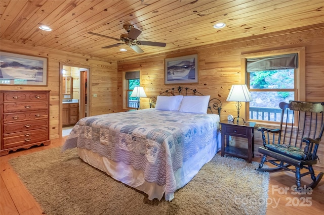 bedroom featuring wood ceiling, wood walls, recessed lighting, and wood finished floors