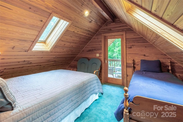 carpeted bedroom featuring vaulted ceiling with skylight, wooden walls, wooden ceiling, and access to exterior
