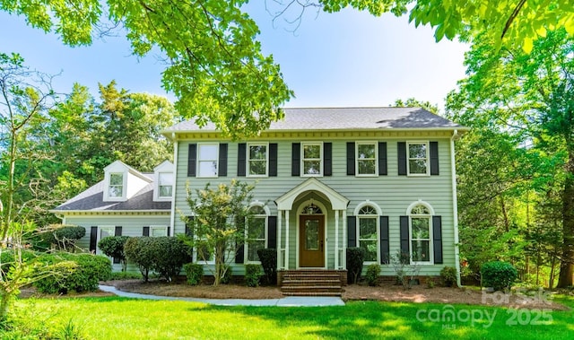5232 Silchester Ln, Charlotte, NC 28215 - view of front of property with a front lawn and roof with shingles