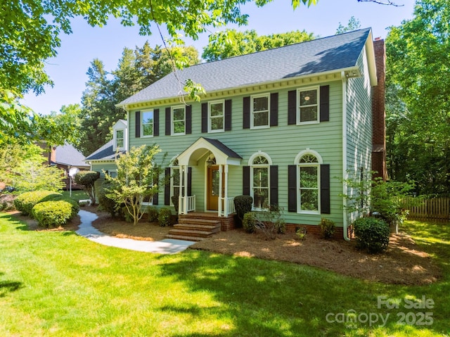 5232 Silchester Ln, Charlotte, NC 28215 - view of front facade featuring a chimney and a shingled roof