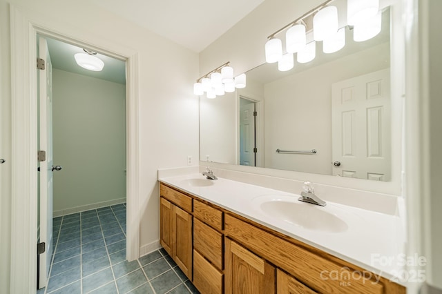 5232 Silchester Ln, Charlotte, NC 28215 - full bathroom featuring double vanity, tile patterned floors, and baseboards