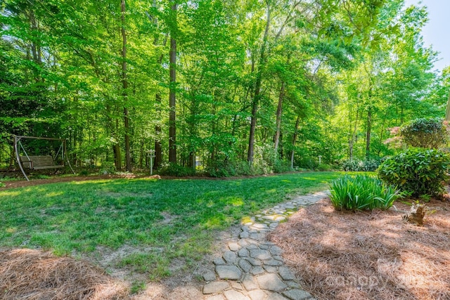 5232 Silchester Ln, Charlotte, NC 28215 - view of green lawn with a wooded view