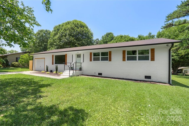 1315 Vickie Ln, Matthews, NC 28104 - single story home featuring crawl space, a garage, a front lawn, and driveway