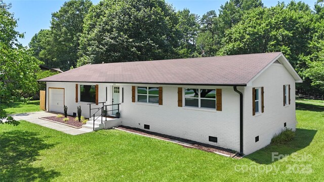 1315 Vickie Ln, Matthews, NC 28104 - ranch-style home featuring crawl space, roof with shingles, brick siding, a front yard, and a garage