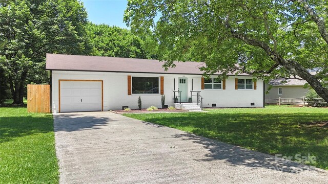 1315 Vickie Ln, Matthews, NC 28104 - ranch-style home with crawl space, a garage, concrete driveway, and brick siding