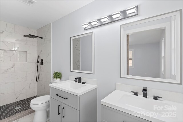 1315 Vickie Ln, Matthews, NC 28104 - full bathroom with vanity, a marble finish shower, and marble look tiles
