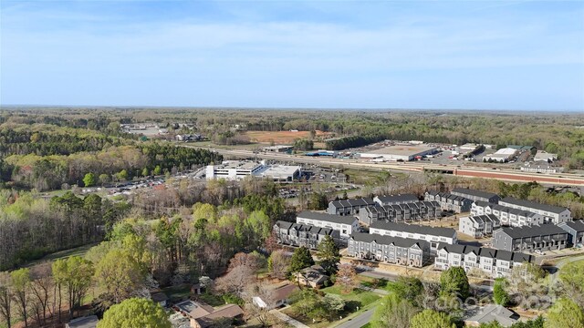 1315 Vickie Ln, Matthews, NC 28104 - aerial overview of property's location with a forest