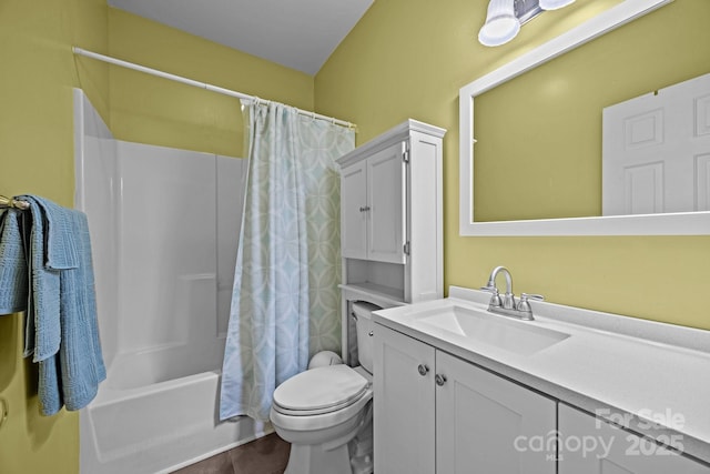 full bath with toilet, vanity, and shower / bath combo with shower curtain