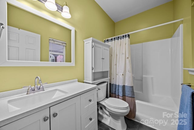 full bathroom with toilet, vanity, tile patterned flooring, and shower / bath combo