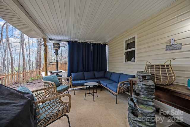 view of patio / terrace featuring fence and outdoor lounge area