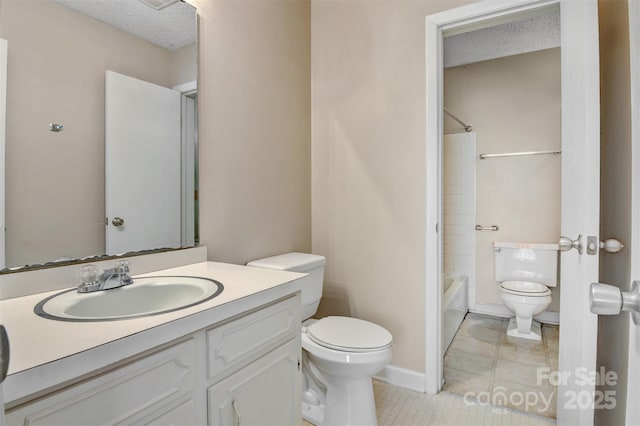 full bathroom with a textured ceiling, toilet, tile patterned floors, vanity, and shower / bathing tub combination