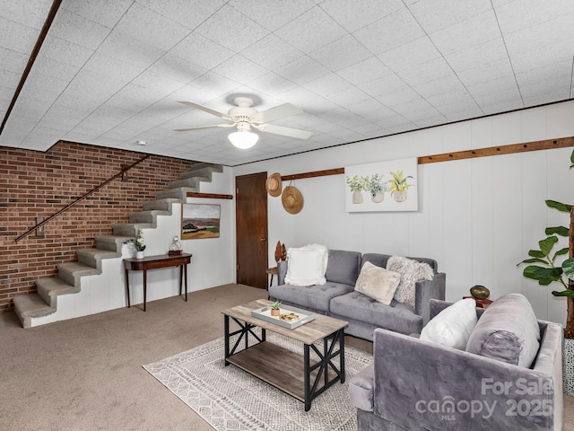 1469 Old Fort Rd, Fairview, NC 28730 - carpeted living room featuring stairway and a ceiling fan