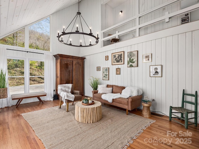 1469 Old Fort Rd, Fairview, NC 28730 - living room featuring high vaulted ceiling, a chandelier, and hardwood / wood-style flooring