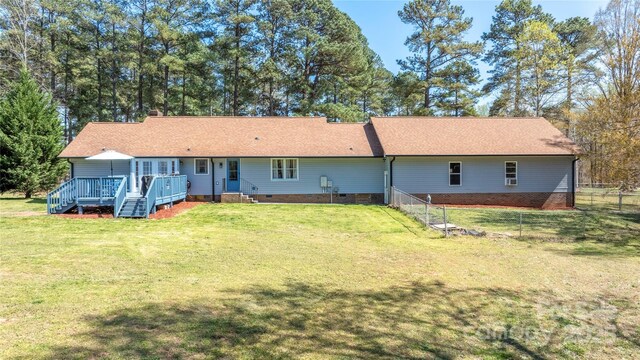 4487 Catawba Burris Rd, Denver, NC 28037 - back of property featuring a wooden deck, crawl space, fence, and a lawn