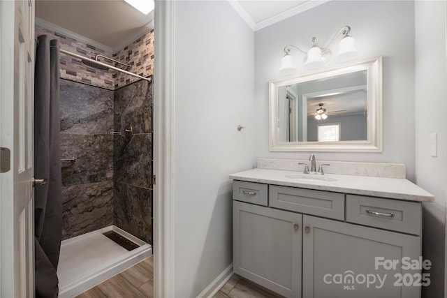 4487 Catawba Burris Rd, Denver, NC 28037 - full bath featuring a tile shower, crown molding, vanity, a ceiling fan, and baseboards