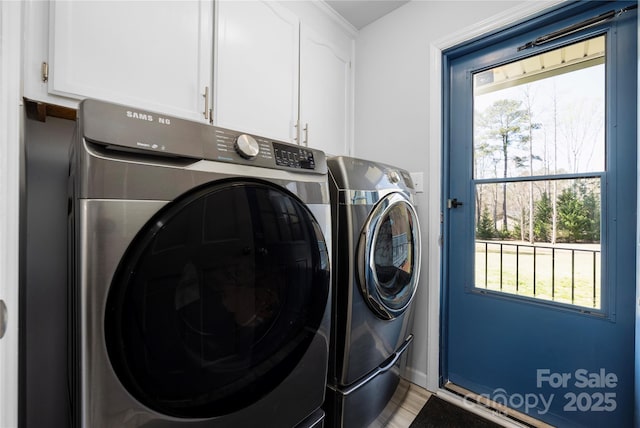 4487 Catawba Burris Rd, Denver, NC 28037 - laundry area featuring cabinet space and separate washer and dryer