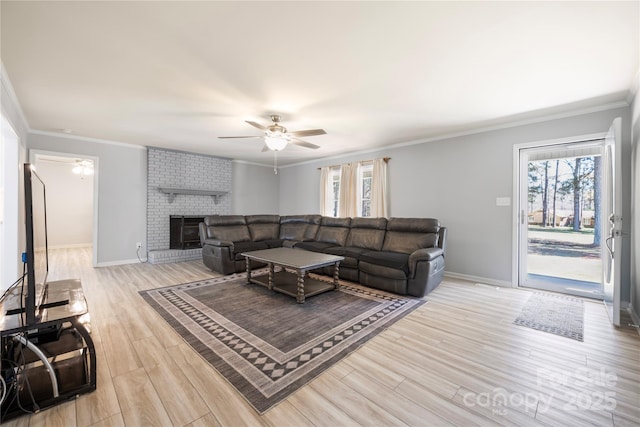 4487 Catawba Burris Rd, Denver, NC 28037 - living room featuring a ceiling fan, ornamental molding, baseboards, and light wood-style flooring