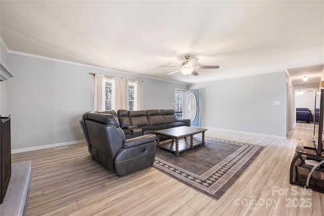 4487 Catawba Burris Rd, Denver, NC 28037 - living room featuring light wood finished floors, baseboards, crown molding, and a ceiling fan