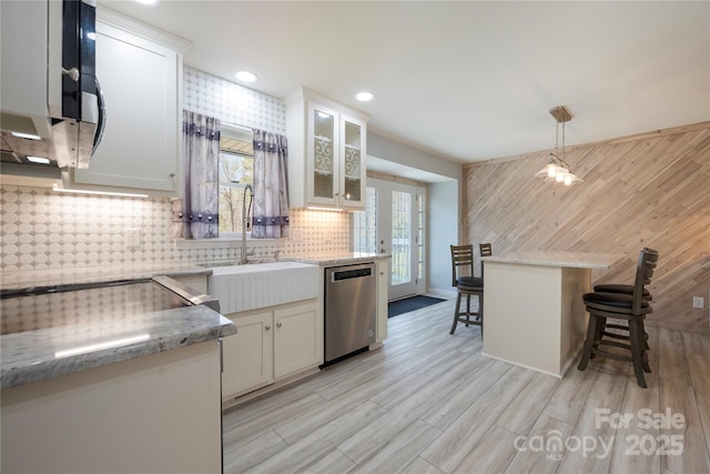 4487 Catawba Burris Rd, Denver, NC 28037 - kitchen with dishwasher, white cabinets, a sink, and hanging light fixtures
