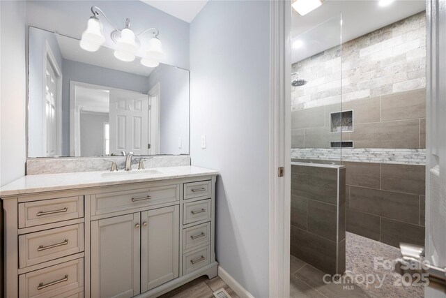 4487 Catawba Burris Rd, Denver, NC 28037 - full bath featuring vanity, baseboards, and walk in shower
