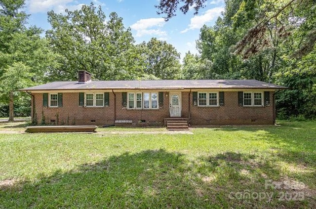 2681 University Dr, Lancaster, SC 29720 - ranch-style house featuring crawl space, a chimney, and a front lawn