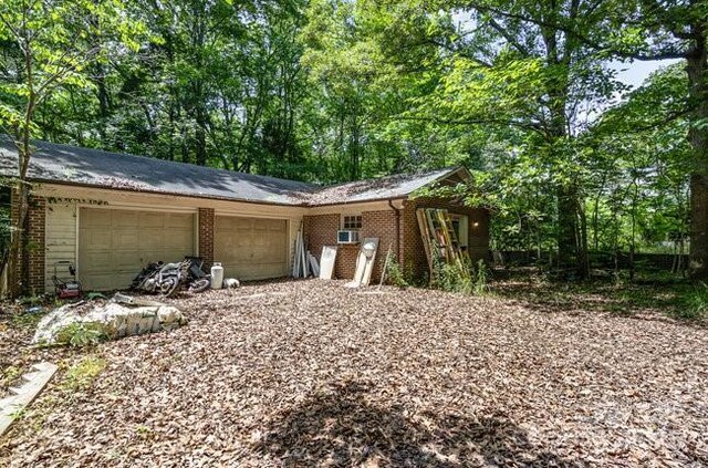 2681 University Dr, Lancaster, SC 29720 - exterior space with brick siding and an attached garage