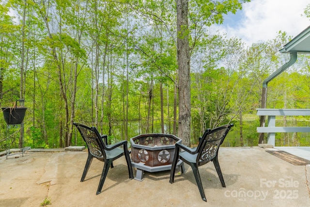 view of patio / terrace featuring a fire pit