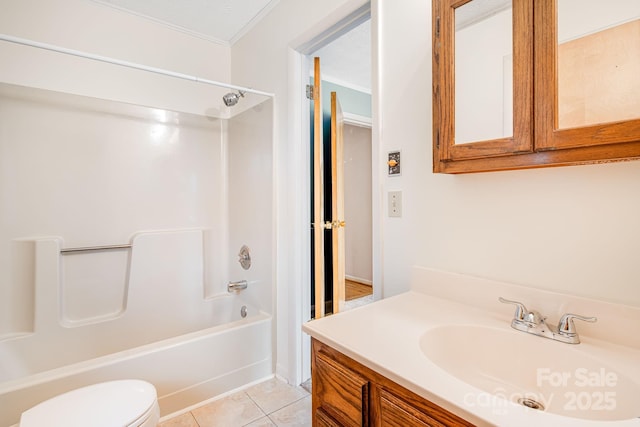 bathroom with bathtub / shower combination, tile patterned floors, toilet, and vanity