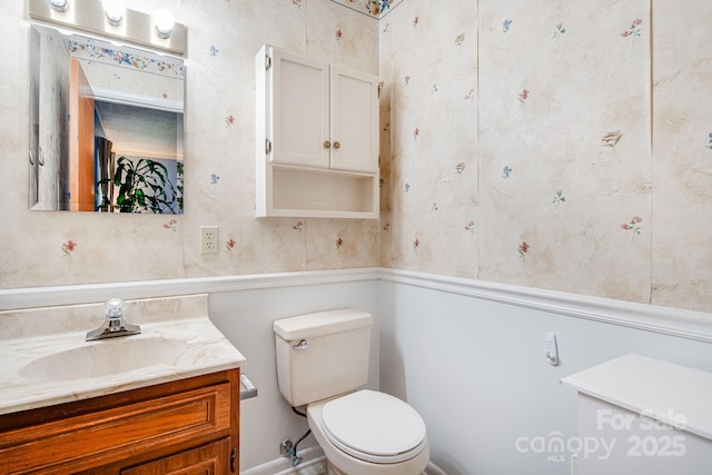 half bath with toilet and vanity