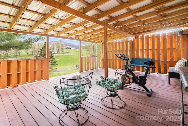 wooden terrace featuring a mountain view