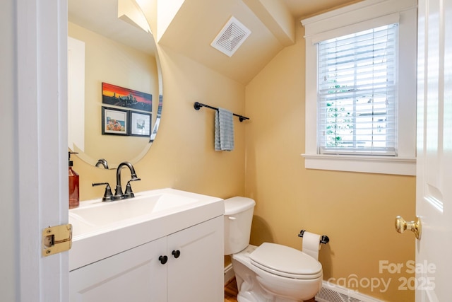 734 E 10th St, Charlotte, NC 28202 - bathroom featuring visible vents, toilet, and vanity