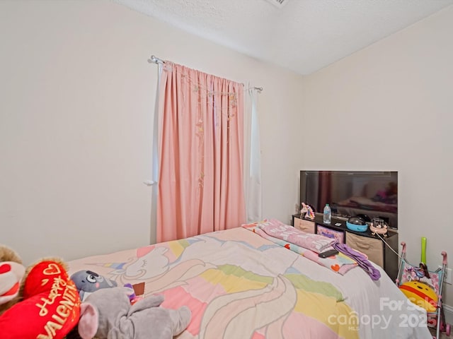 bedroom with a textured ceiling