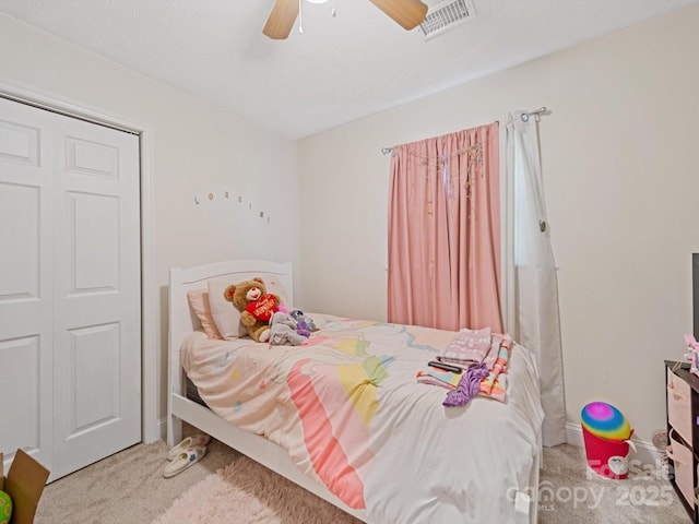 carpeted bedroom featuring a ceiling fan