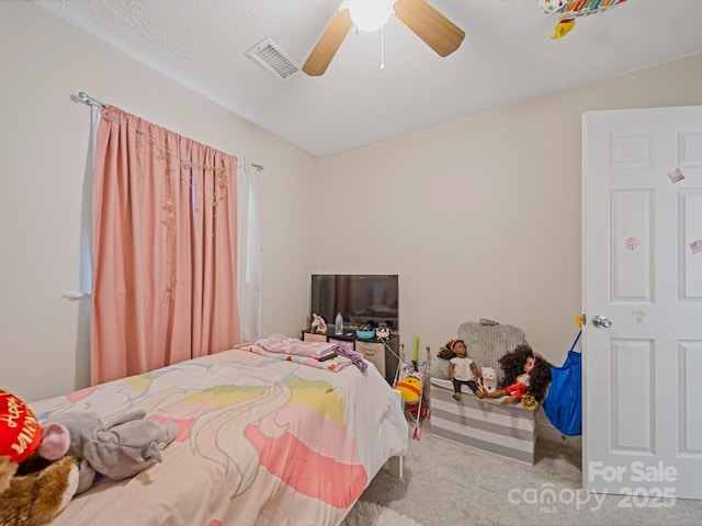 bedroom featuring carpet floors and a ceiling fan