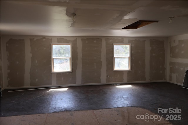 spare room featuring healthy amount of natural light