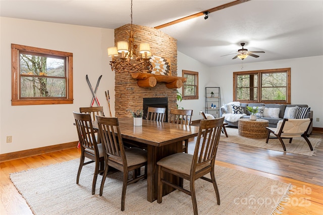 39 Antler Springs Way, Maggie Valley, NC 28751 - dining area featuring light wood finished floors, lofted ceiling, ceiling fan, baseboards, and a chandelier