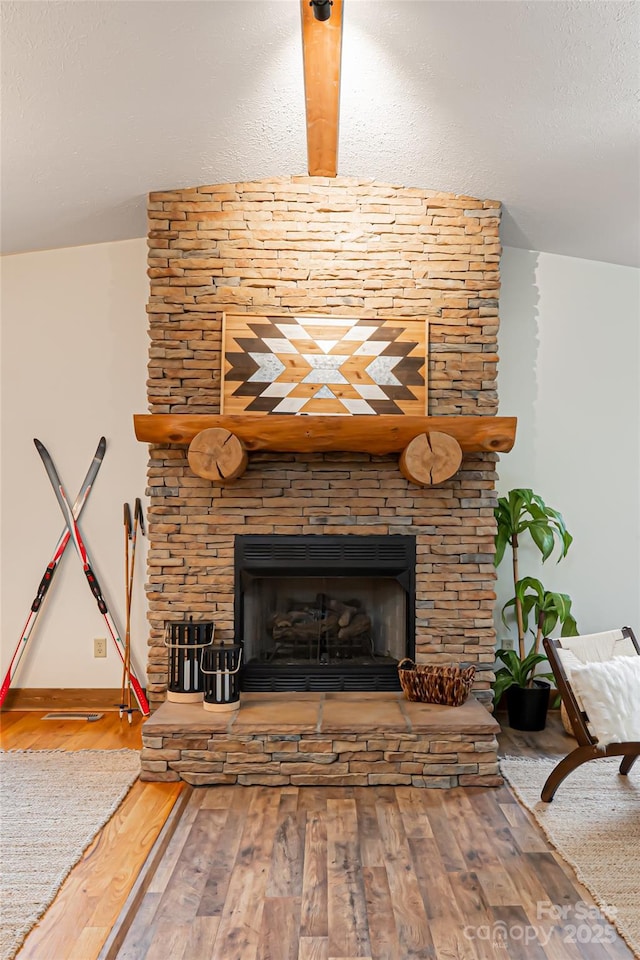 39 Antler Springs Way, Maggie Valley, NC 28751 - detailed view of wood finished floors, a fireplace, and baseboards