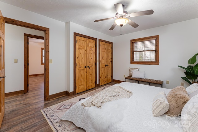 39 Antler Springs Way, Maggie Valley, NC 28751 - bedroom with wood finished floors, baseboards, multiple closets, and ceiling fan