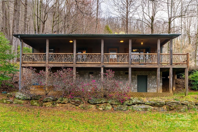 39 Antler Springs Way, Maggie Valley, NC 28751 - view of front of house featuring stone siding and a wooden deck