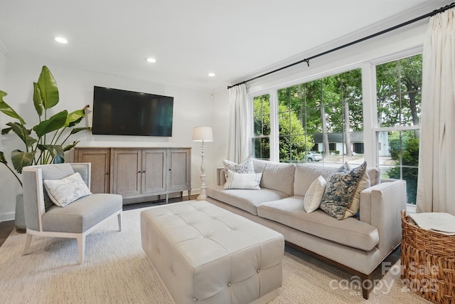 living room with crown molding and recessed lighting