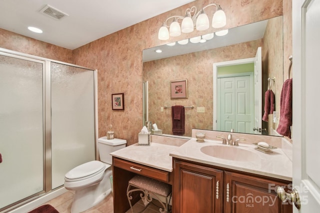 full bath featuring tile patterned flooring, visible vents, toilet, vanity, and a stall shower
