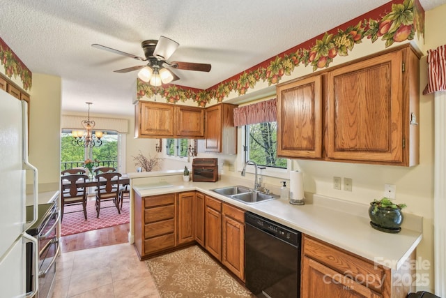 kitchen with a sink, brown cabinets, and black dishwasher