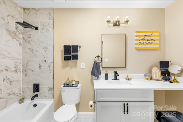 bathroom with toilet, vanity, baseboards, and  shower combination