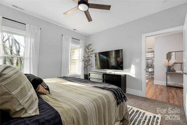 9849 Rich Hatchet Rd, Huntersville, NC 28078 - carpeted bedroom featuring baseboards, visible vents, and ceiling fan