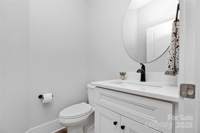 9849 Rich Hatchet Rd, Huntersville, NC 28078 - half bath featuring toilet, vanity, and baseboards