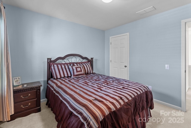 bedroom with light carpet, baseboards, and visible vents