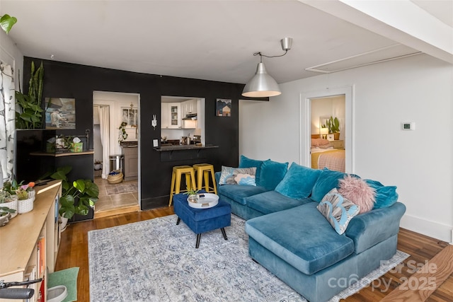 21 Hilldale Rd, Asheville, NC 28803 - living area with baseboards, attic access, and wood finished floors