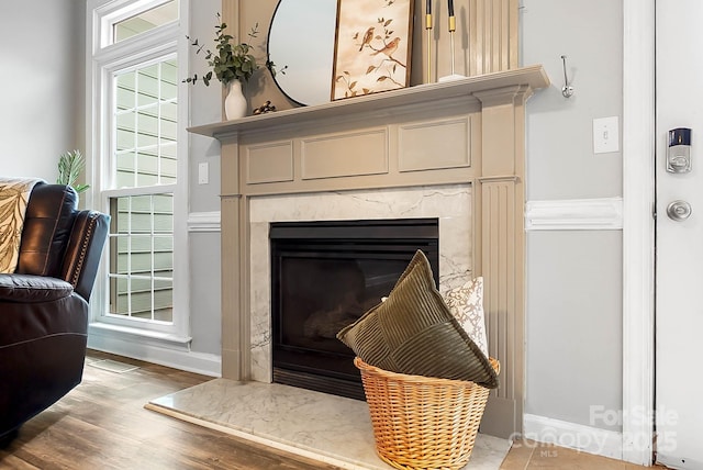 1214 Foxfield Rd, Waxhaw, NC 28173 - detailed view of a high end fireplace, wood finished floors, and baseboards