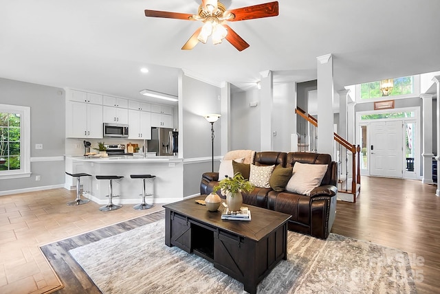 1214 Foxfield Rd, Waxhaw, NC 28173 - living room featuring ceiling fan, stairway, recessed lighting, and baseboards