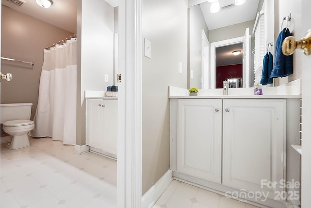 1214 Foxfield Rd, Waxhaw, NC 28173 - full bath with vanity, toilet, tile patterned floors, and baseboards